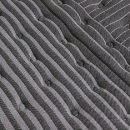 hand pressing on the beautyrest black series one extra firm mattress