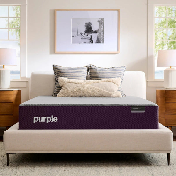 Purple RestorePlus™ Hybrid Mattress on modern bed frame in bright bedroom