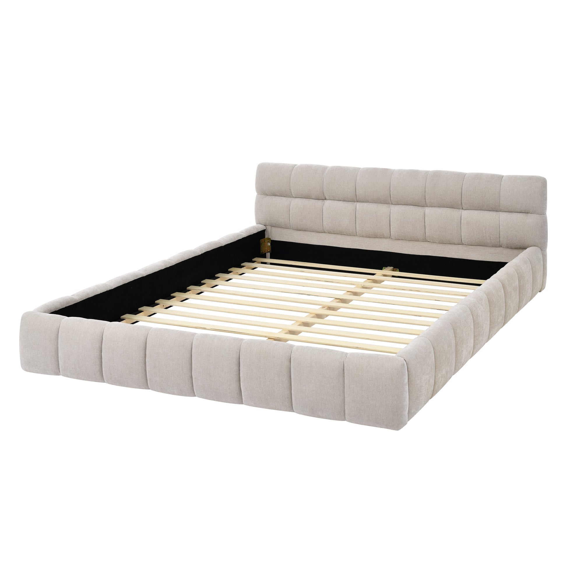 Beige upholstered bed with tufted headboard on a white background
