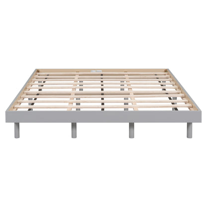 Bed frame with wooden slats on a white background