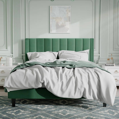 Queen size green upholstered bed with white bedding in a stylish bedroom.