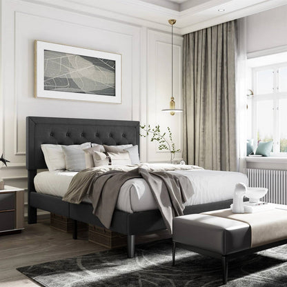 Black queen tufted bed frame in modern bedroom with luxury bedding