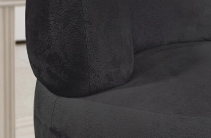 Close-up of a dark gray cushion on a chair