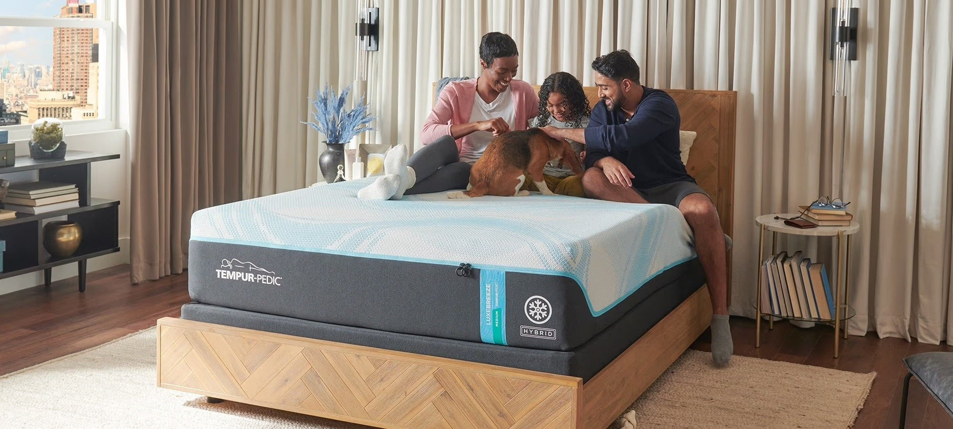 The best place to buy a tempurpedic - family in modern room on tempurpedic luxe breeze medium hybrid - on sale now at Sleep City