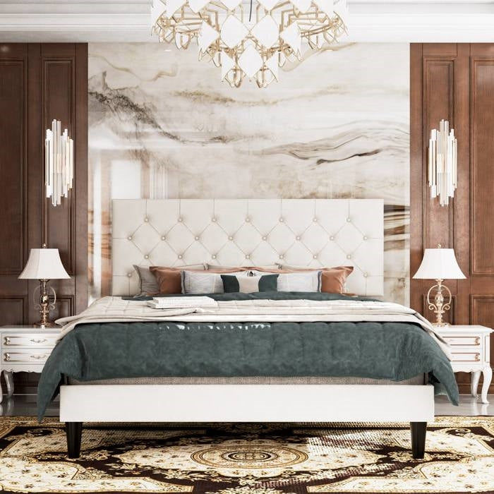 Luxurious bedroom with marble wall, full size white faux leather tufted headboard, and elegant decor.