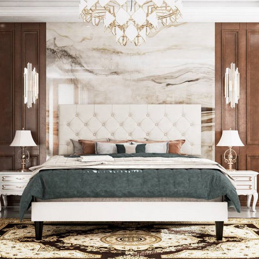 Luxurious bedroom with marble wall, full size white faux leather tufted headboard, and elegant decor.