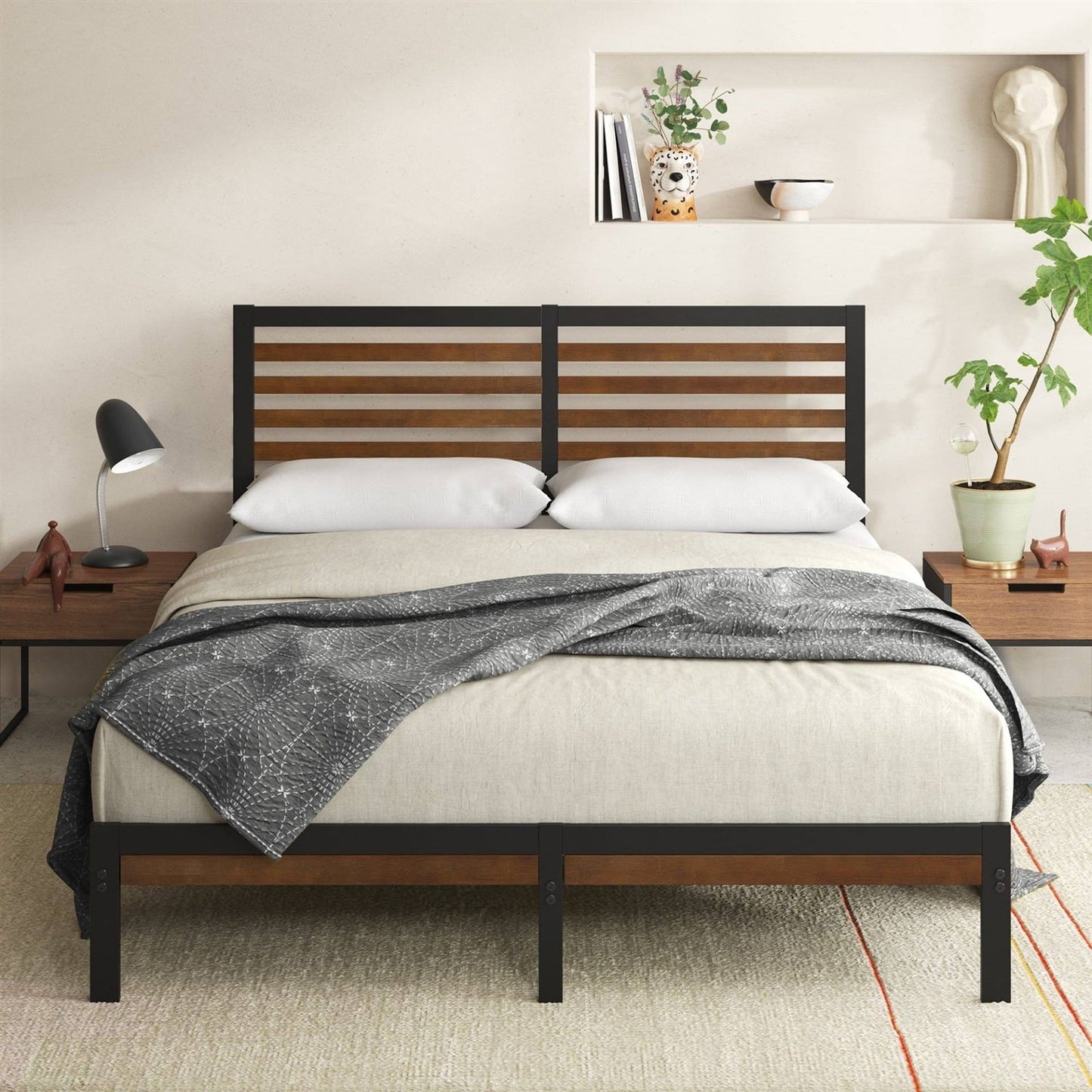King size platform metal bed frame with wooden slats and black frame in a bedroom setting