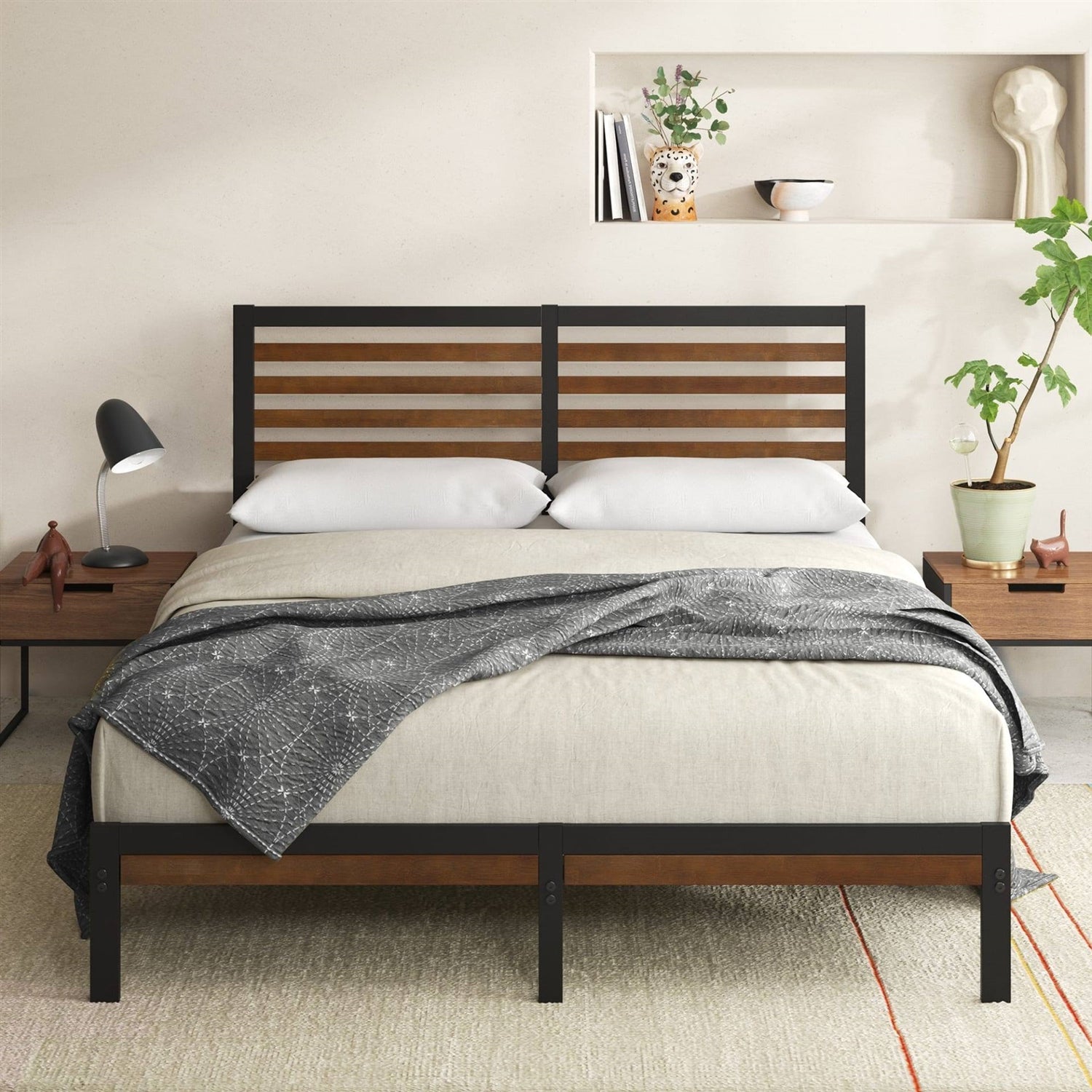 King size platform metal bed frame with wooden slats and black frame in a bedroom setting