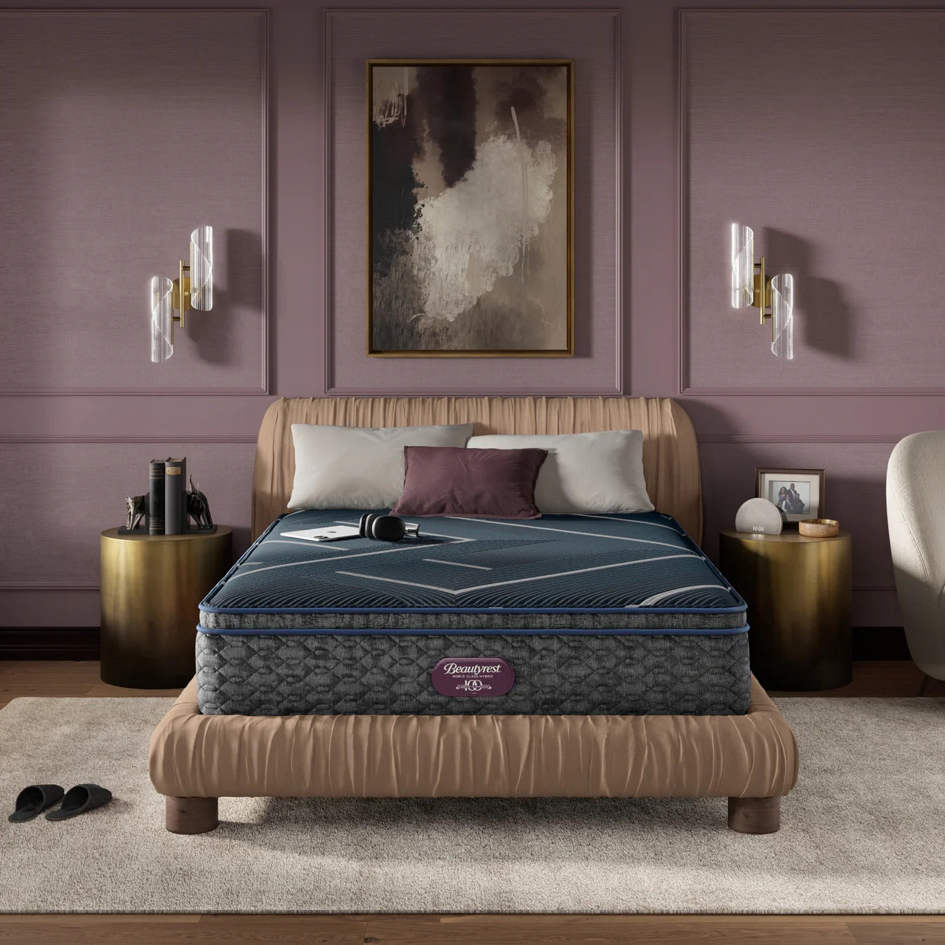 Bed with mattress in a bedroom setting with purple walls and decorative elements.